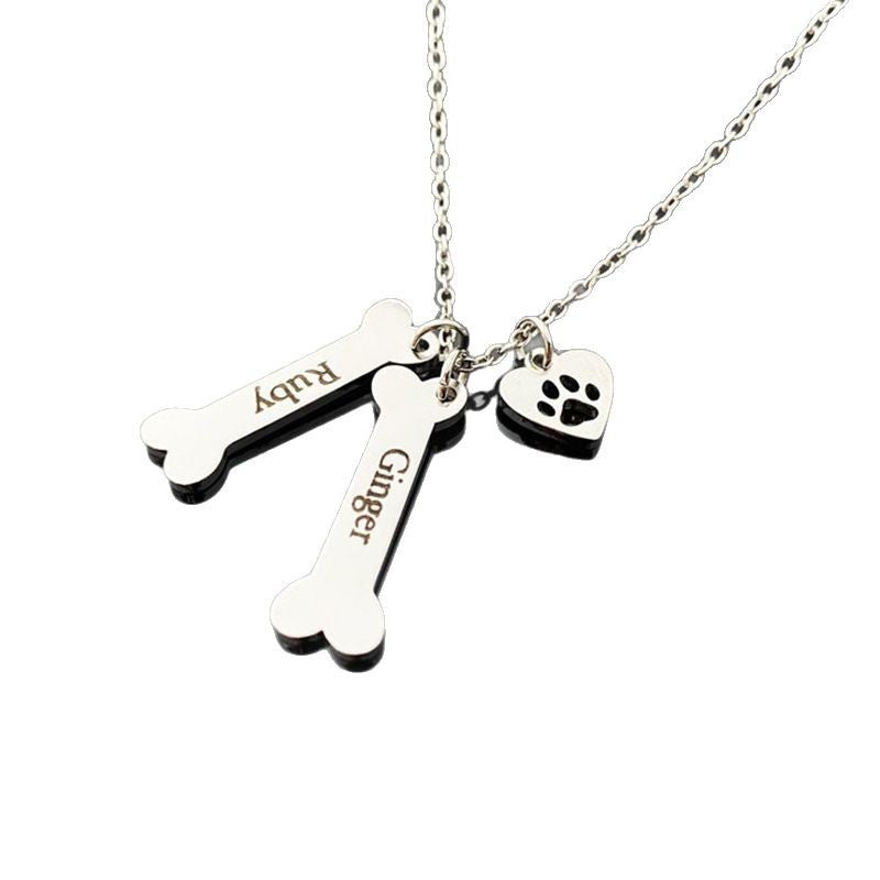 Pet memorial necklace with engraved bone charms, personalized dog name pendant