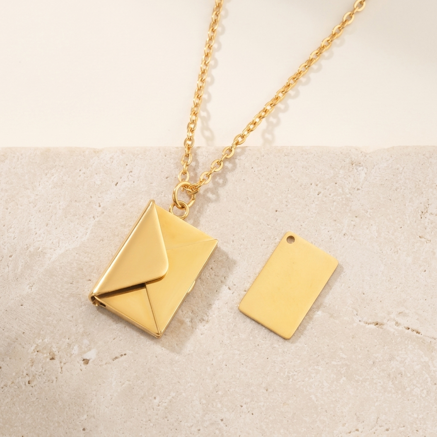 Gold envelope locket necklace with personalized pull-out letter