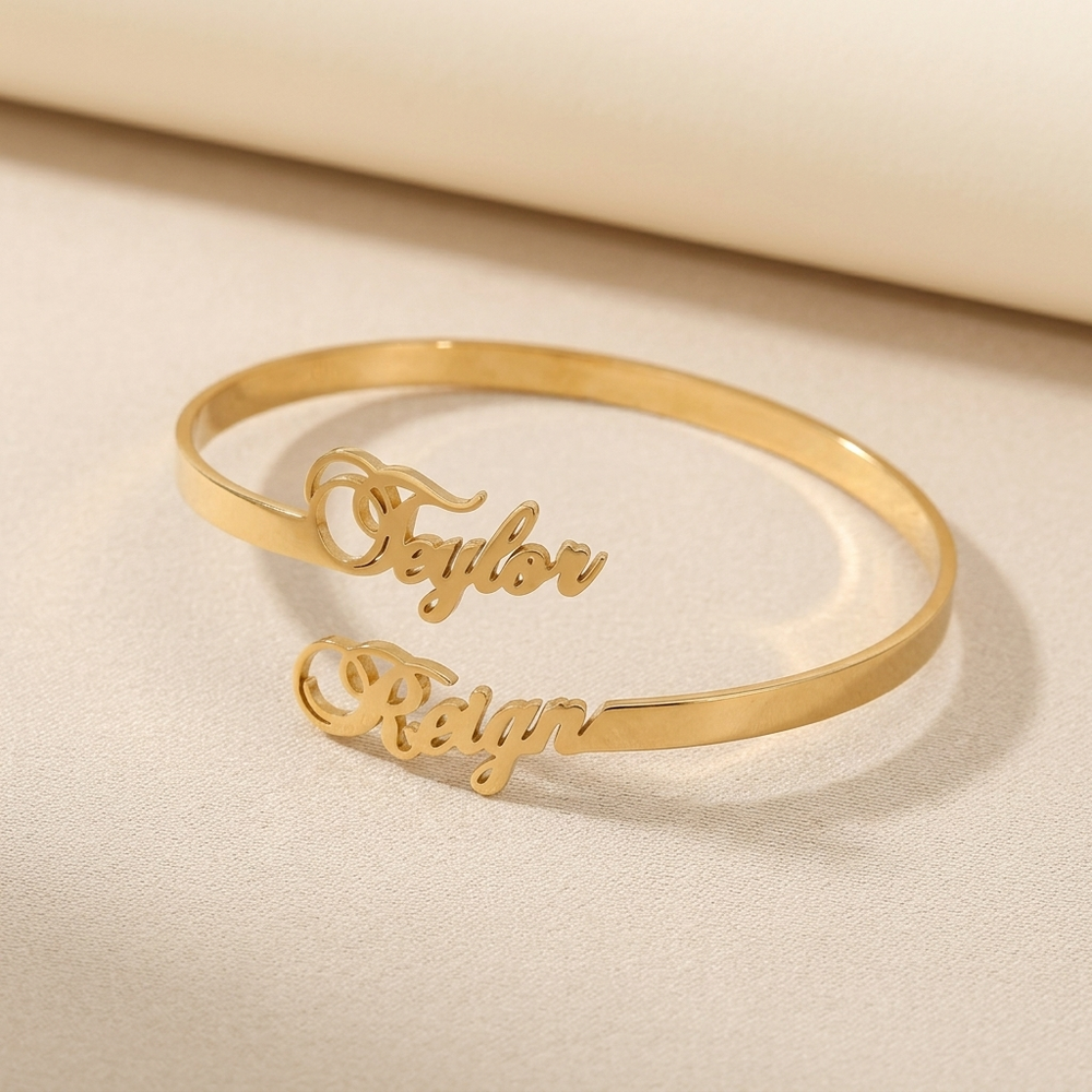 Personalized couples bracelet engraved with two names in gold