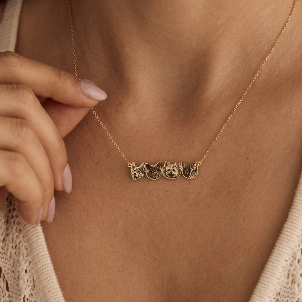 Engraved pet face pendants close-up on personalized necklace