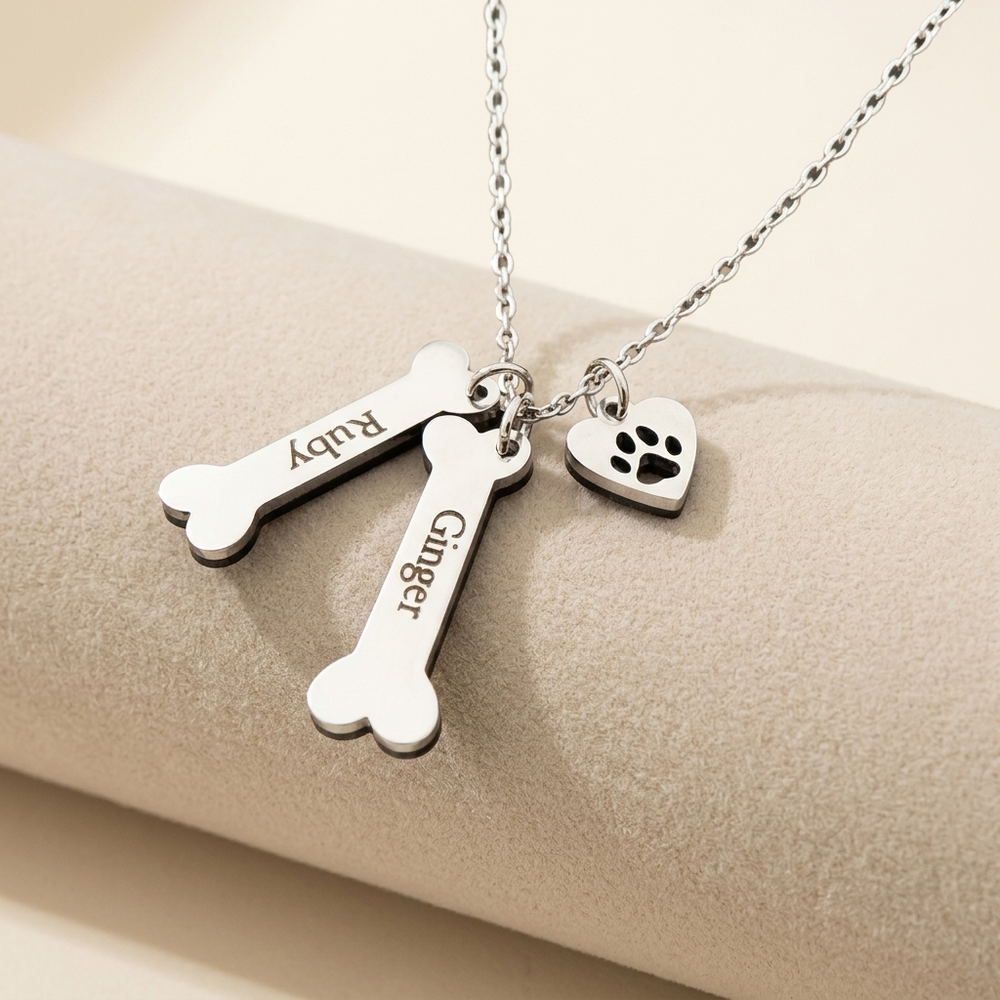 Engraved bone charms detail on personalized memorial necklace